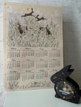 Календарь на холсте и заяц-копилка из фанеры